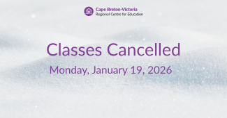 Purple text on snow-covered background reads: “Classes Cancelled. Monday, January 19, 2026.”
