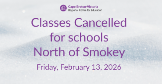 Purple text on snow-covered background reads: “Classes cancelled for schools North of Smokey. Friday, February 13, 2026."